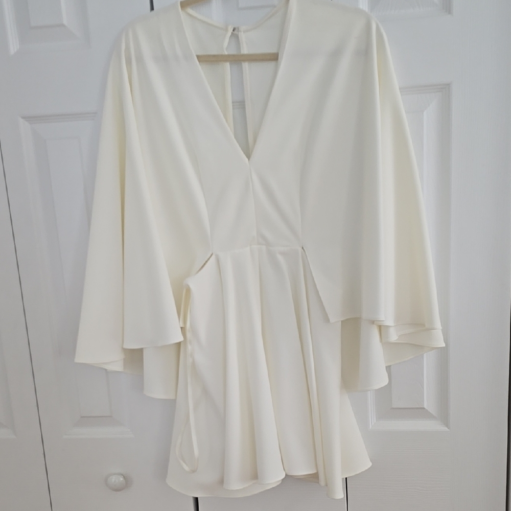 Elegant Cream Dress with Flared Sleeves